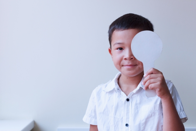 child with eye exam